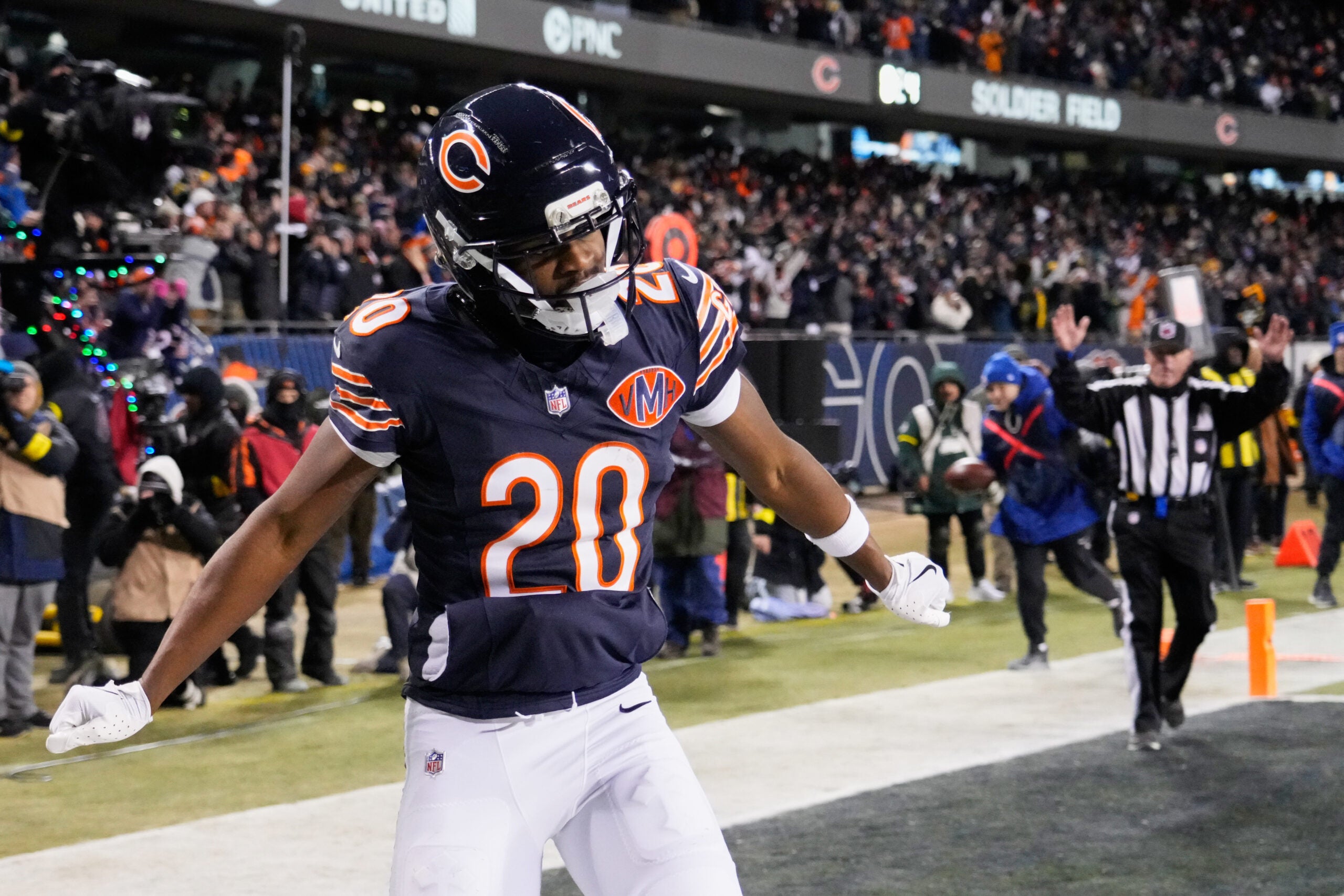 Dec 20, 2025; Chicago, Illinois, USA; Chicago Bears wide receiver Jahdae Walker (20) celebrates after catching a six-yard touchdown pass thrown by quarterback Caleb Williams (not pictured) against the Green Bay Packers with twenty-four seconds remaining in the fourth quarter at Soldier Field.