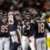 Chicago Bears quarterback Caleb Williams (18) is swarmed by teammates after throwing the game-winning touchdown pass in overtime against the Green Bay Packers during their football game Saturday, December 20, 2025, at Soldier Field in Chicago, Illinois.