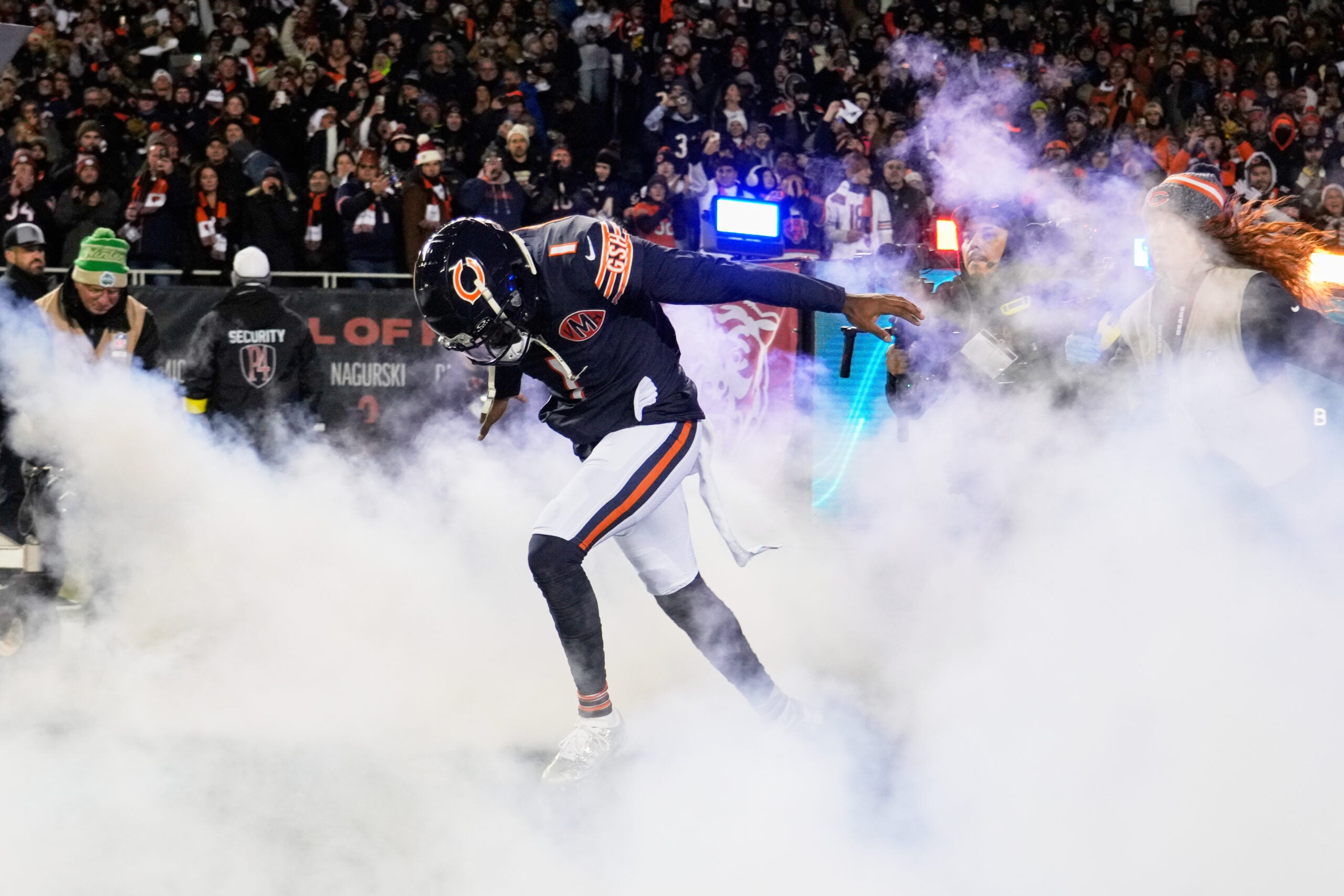 Dec 20, 2025; Chicago, Illinois, USA; Chicago Bears cornerback Jaylon Johnson (1) runs onto the field during player introductions before the game against the Green Bay Packers at Soldier Field.