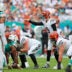 Dec 21, 2025; Miami Gardens, Florida, USA; Cincinnati Bengals quarterback Joe Burrow (9) reacts during a play during the first quarter against the Miami Dolphins at Hard Rock Stadium.