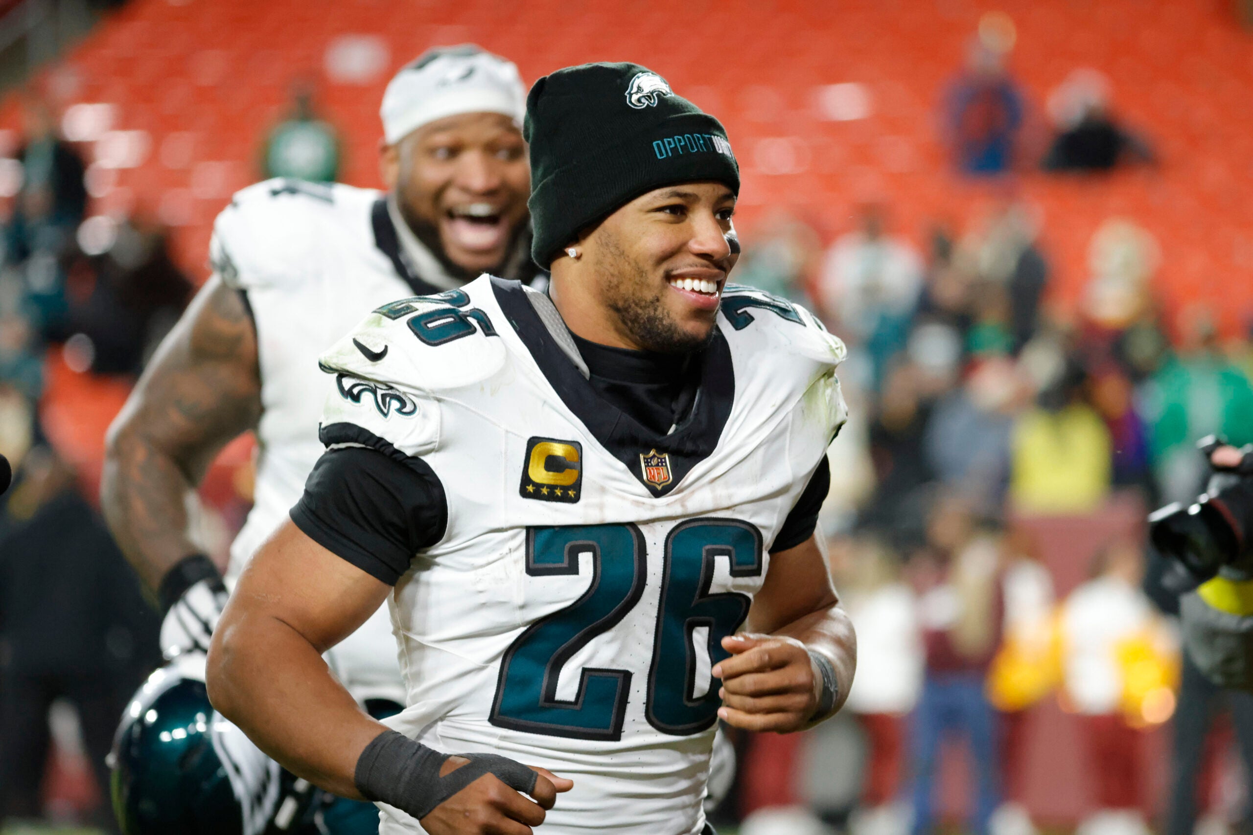 Dec 20, 2025; Landover, Maryland, USA; Philadelphia Eagles running back Saquon Barkley (26) runs off the field after the game against the Washington Commanders at Northwest Stadium.