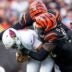 Cincinnati Bengals defensive tackle T.J. Slaton Jr. (98) pulls down Arizona Cardinals quarterback Jacoby Brissett (7) in the third quarter of the NFL Week 17 game between the Cincinnati Bengals and the Arizona Cardinals at Paycor Stadium in Downtown Cincinnati on Sunday, Dec. 28, 2025. The Bengals won 37-14.