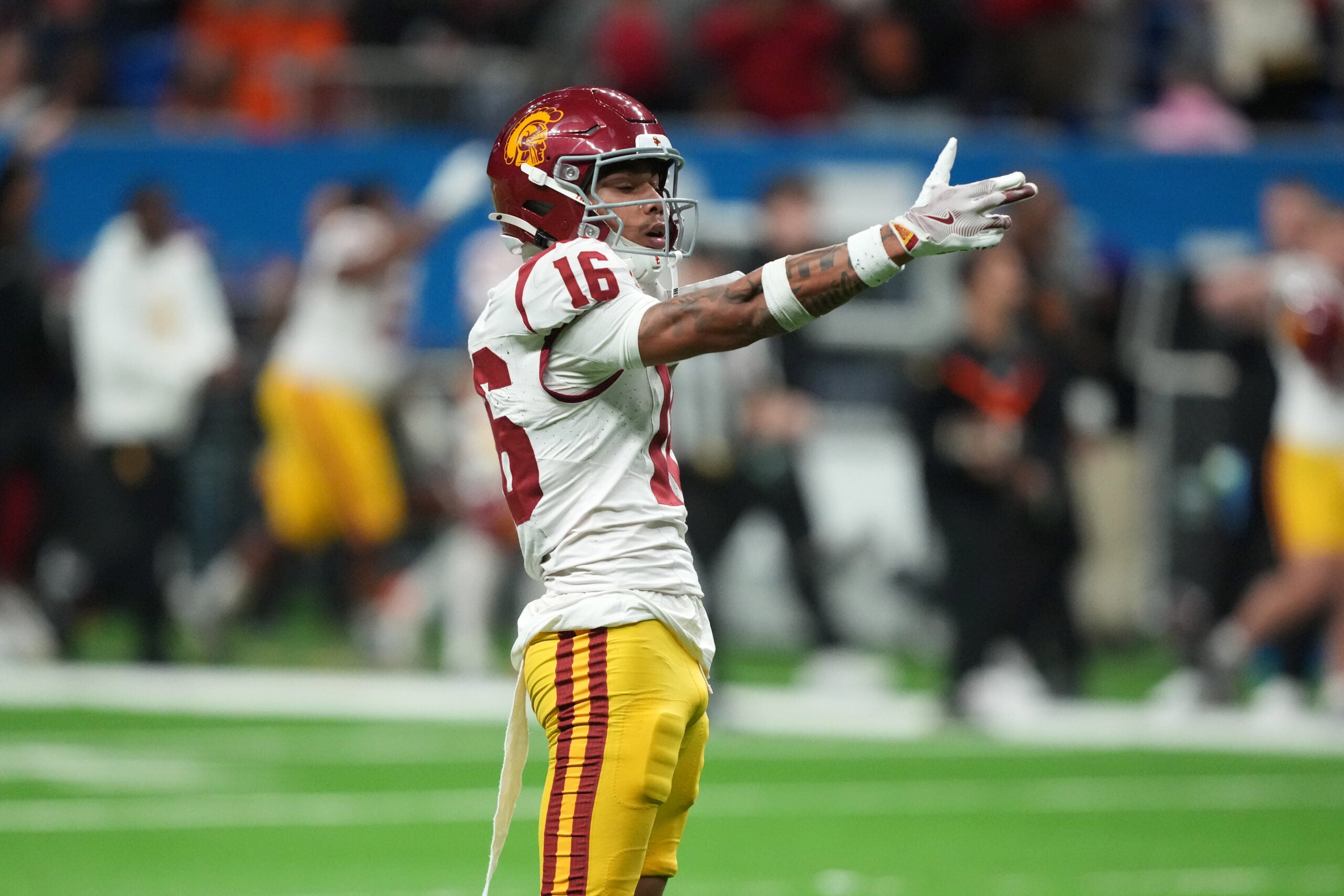 Dec 30, 2025; San Antonio, TX, USA; Southern California Trojans wide receiver Tanook Hines (16) gestures after a reception against the TCU Horned Frogs in the second half during the Alamo Bowl at Alamodome.