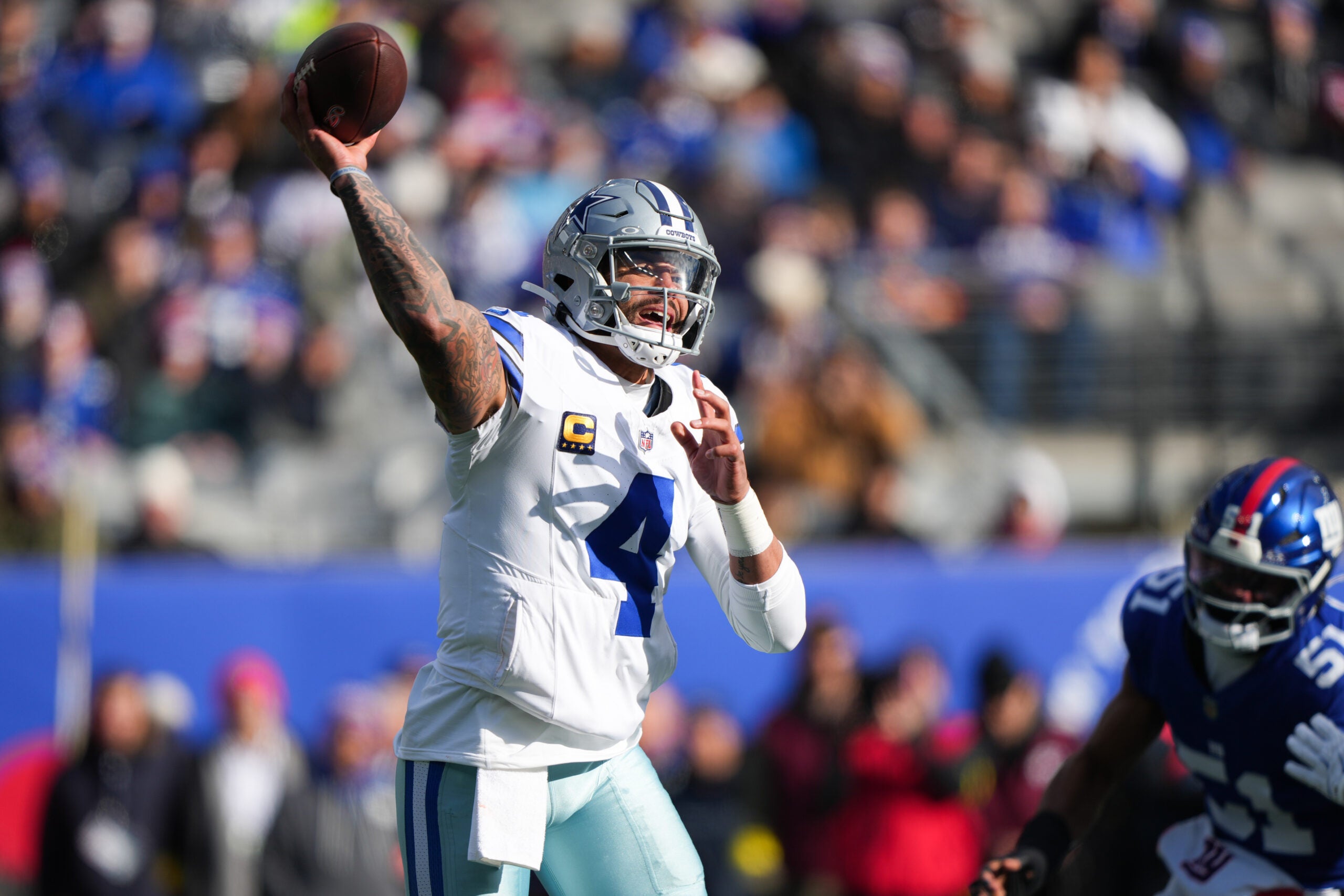Jan 4, 2026; East Rutherford, New Jersey, USA; Dallas Cowboys quarterback Dak Prescott (4) throws a pass during the first quarter against the New York Giants at MetLife Stadium.