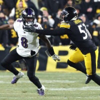 Jan 4, 2026; Pittsburgh, Pennsylvania, USA; Pittsburgh Steelers linebacker Nick Herbig (51) pressures Baltimore Ravens quarterback Lamar Jackson (8) during the second half at Acrisure Stadium.