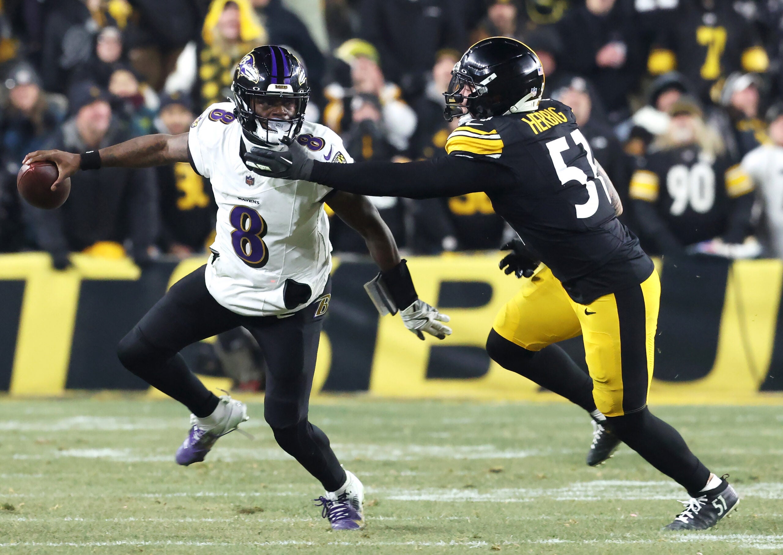 Jan 4, 2026; Pittsburgh, Pennsylvania, USA; Pittsburgh Steelers linebacker Nick Herbig (51) pressures Baltimore Ravens quarterback Lamar Jackson (8) during the second half at Acrisure Stadium.