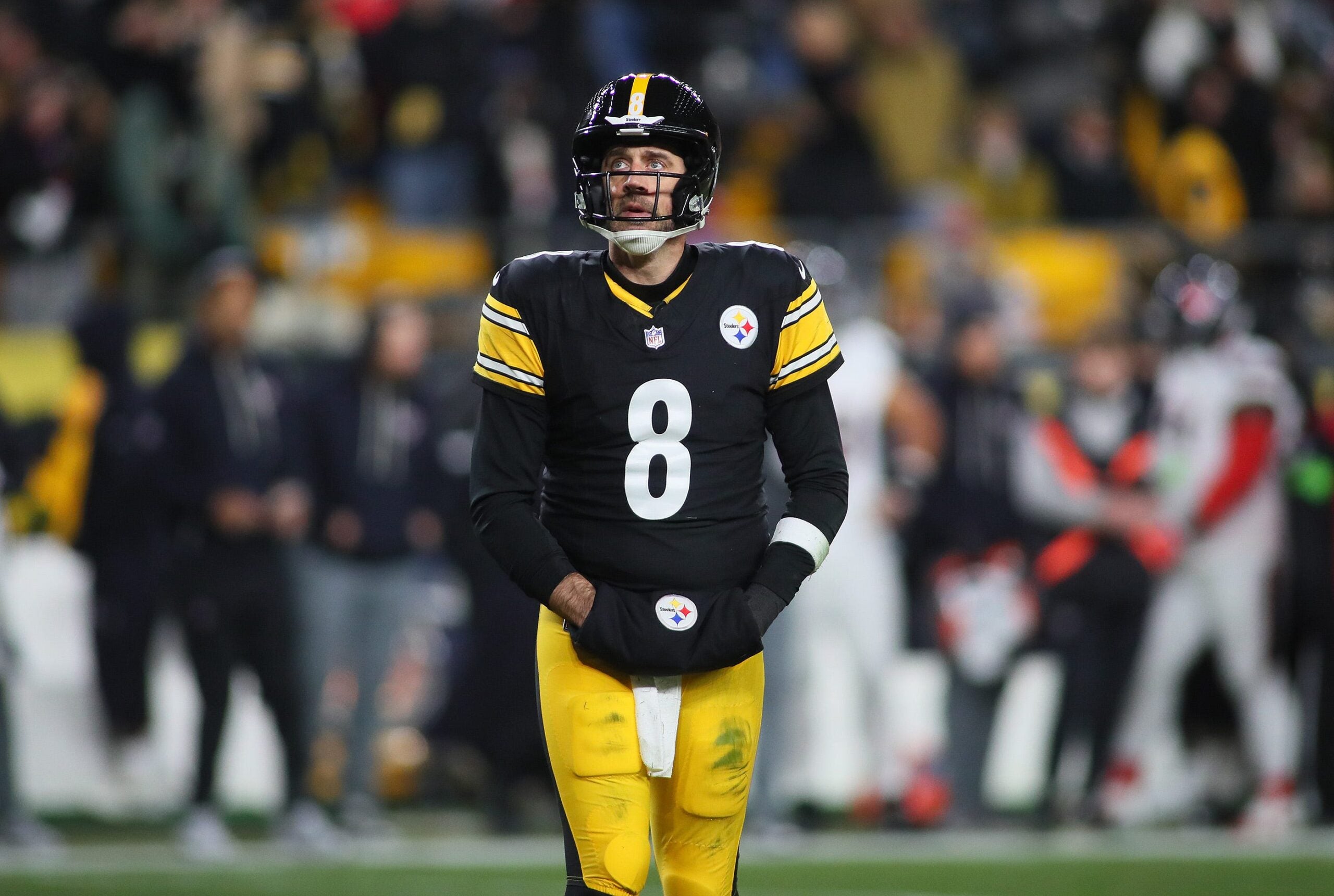 Pittsburgh Steelers quarterback Aaron Rodgers (8) looks on after being sacked during the first half of the NFL Wild Card game against the Houston Texans at Acrisure Stadium in Pittsburgh, PA on January 12, 2026.