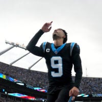 Jan 10, 2026; Charlotte, NC, USA; Carolina Panthers quarterback Bryce Young (9) reflects before an NFC Wild Card Round game at Bank of America Stadium.