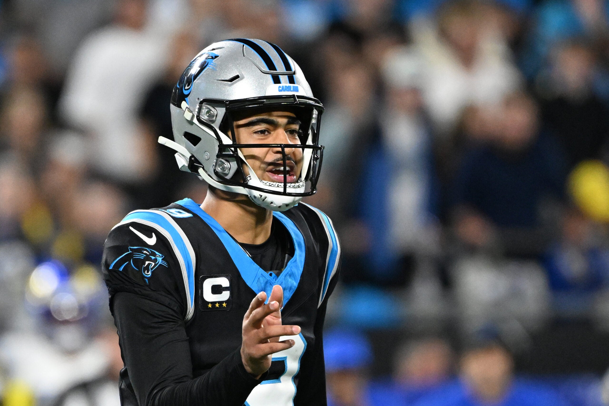 Jan 10, 2026; Charlotte, NC, USA; Carolina Panthers quarterback Bryce Young (9) reacts in the fourth quarter in an NFC Wild Card Round game at Bank of America Stadium.