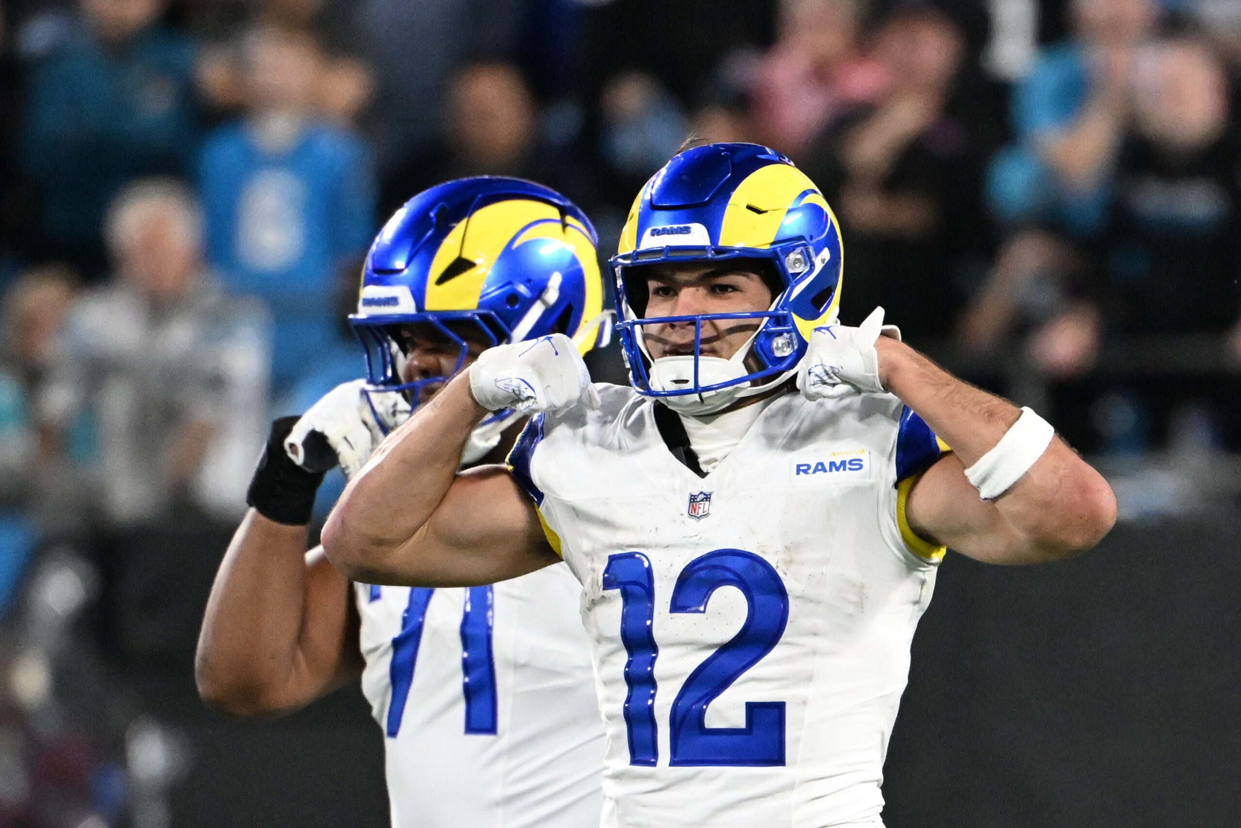 Jan 10, 2026; Charlotte, NC, USA; Los Angeles Rams wide receiver Puka Nacua (12) react in the fourth quarter in an NFC Wild Card Round game at Bank of America Stadium.