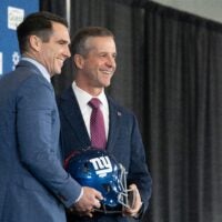 General Manager Joe Schoen and new Giants head coach John Harbaugh hold a NY Giants helmet during a press conference welcoming Harbaugh at the Quest Diagnostics Training Center in East Rutherford on Tuesday, Jan. 20, 2025.