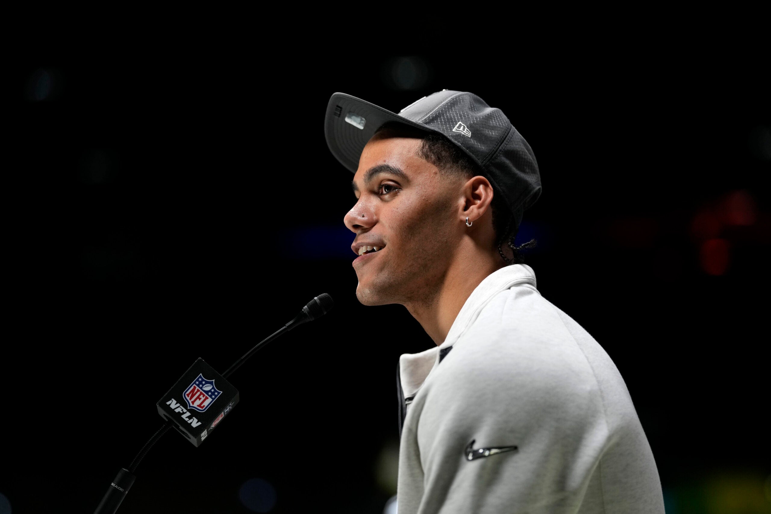 Feb 2, 2026; San Jose, CA, USA; New England Patriots cornerback Christian Gonzalez (0) speaks to media during Opening Night for Super Bowl LX at San Jose Convention Center.