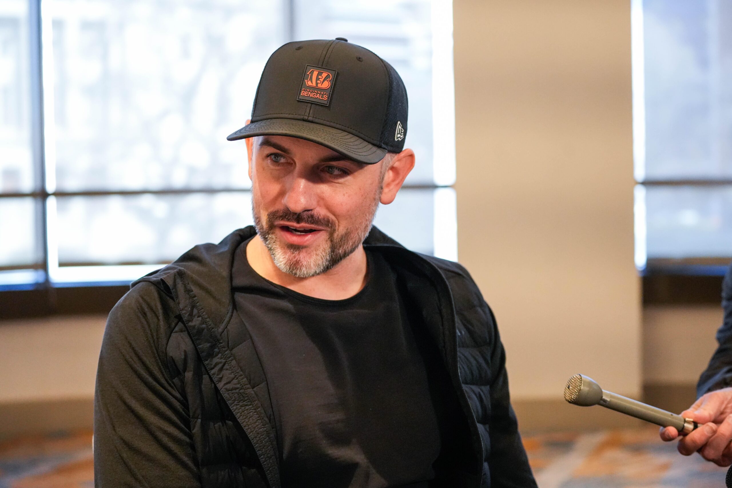 Bengals Offensive Coordinator Dan Pitcher speaks to reporters during the 2026 NFL Combine in Indianapolis.