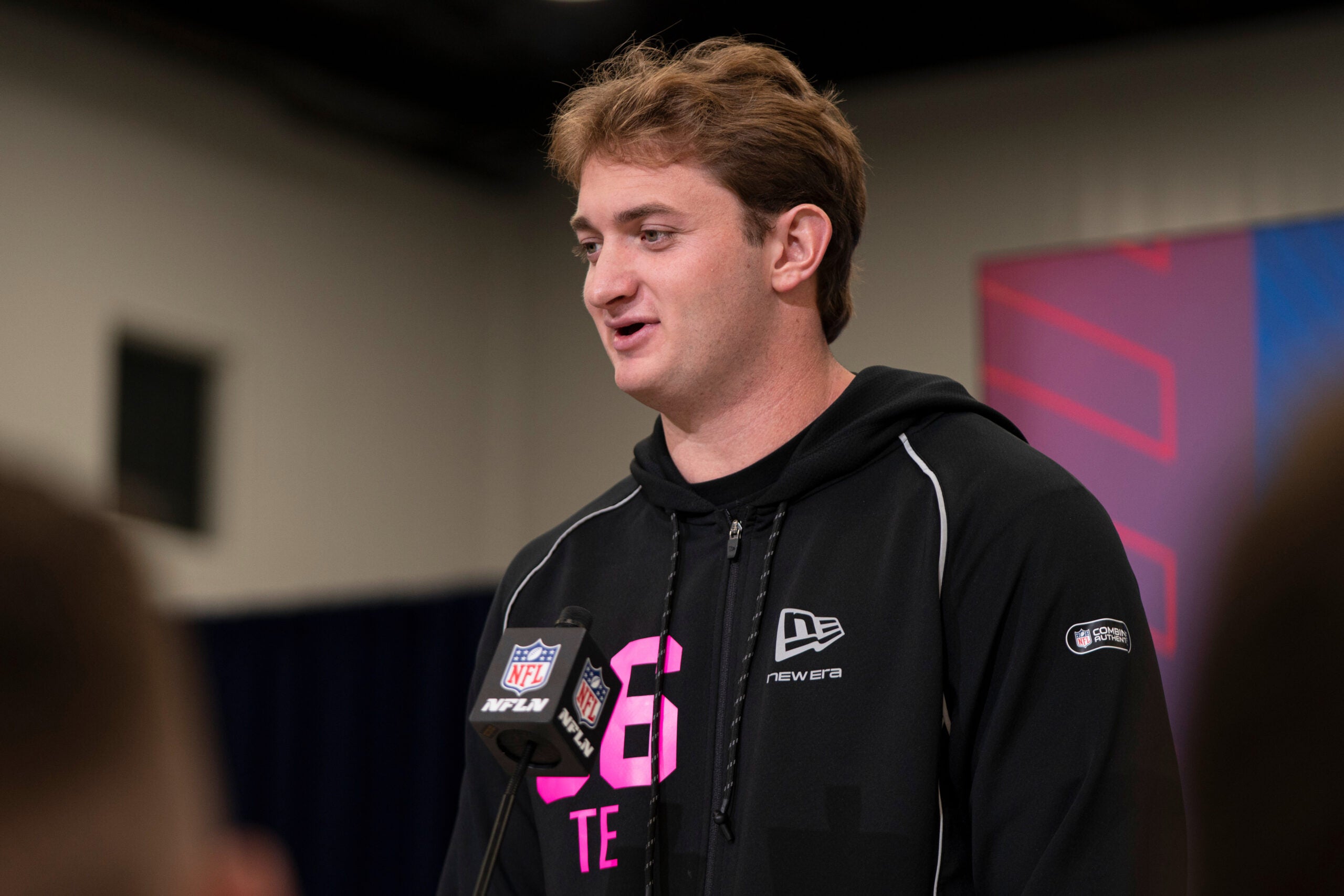 Feb 26, 2026; Indianapolis, IN, USA; Texas tight end Jack Endries (TE06) speaks to members of the media during the NFL Combine at the Indiana Convention Center.
