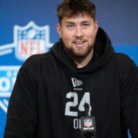 Feb 28, 2026; Indianapolis, IN, USA; Georgia offensive lineman Monroe Freeling (OL24) speaks to members of the media during the NFL Combine at the Indiana Convention Center.