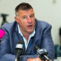 Mar 31, 2026; Phoenix, AZ, USA; New England Patriots head coach Mike Vrabel speaks to reporters in the media during the 2026 NFL Annual League Meeting at the Arizona Biltmore.