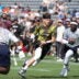Mar 21, 2026; Los Angeles, CA, USA; Wildcats FFC quarterback Joe Burrow carries the ball against Ashton Jeanty of Founders FFC during the Fanatics Flag Football Classic at BMO stadium.