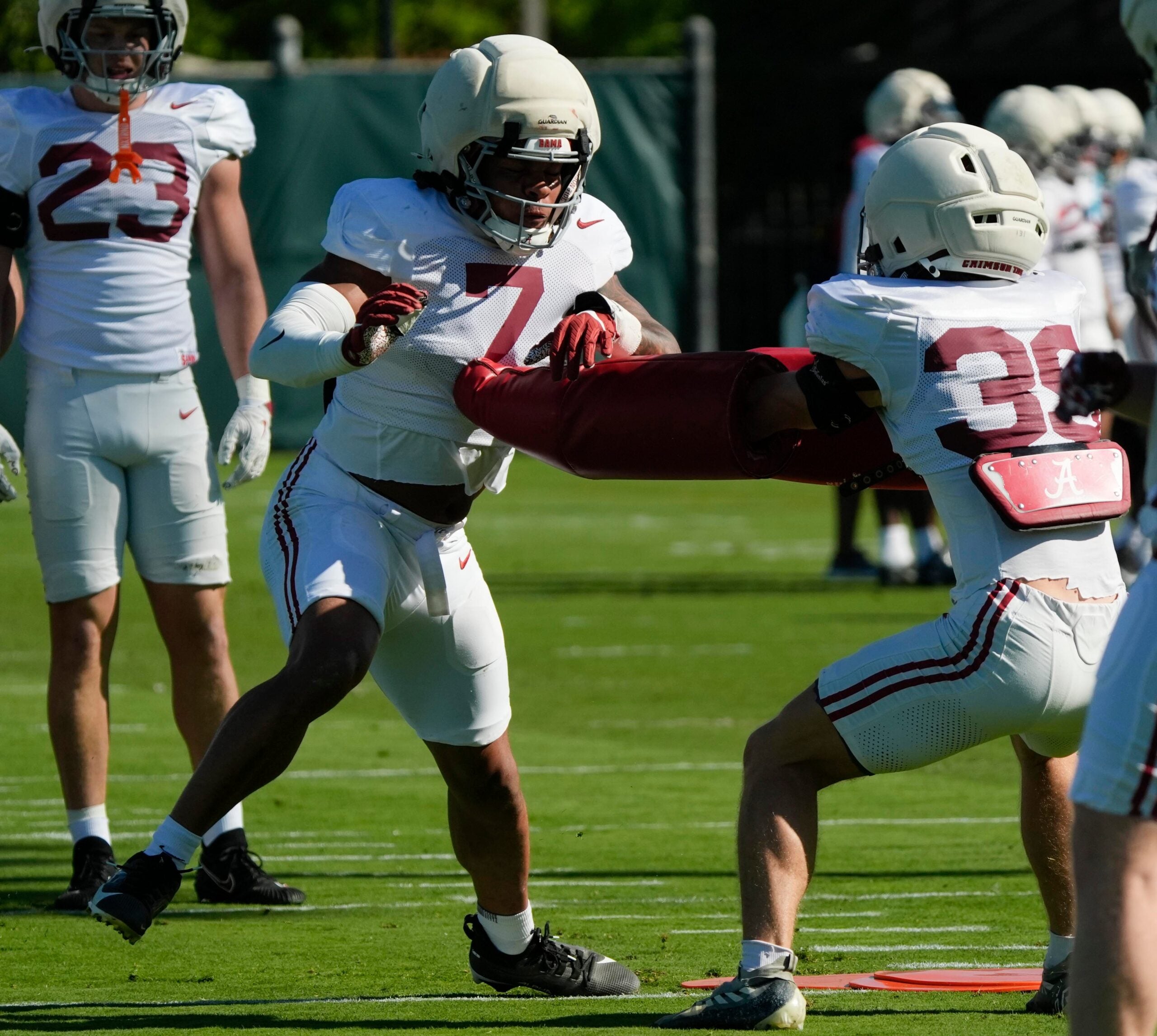 April 7, 2026; Tuscaloosa, AL, USA; Linebacker Caleb Woodson runs a drill during Spring Practice at the University of Alabama.