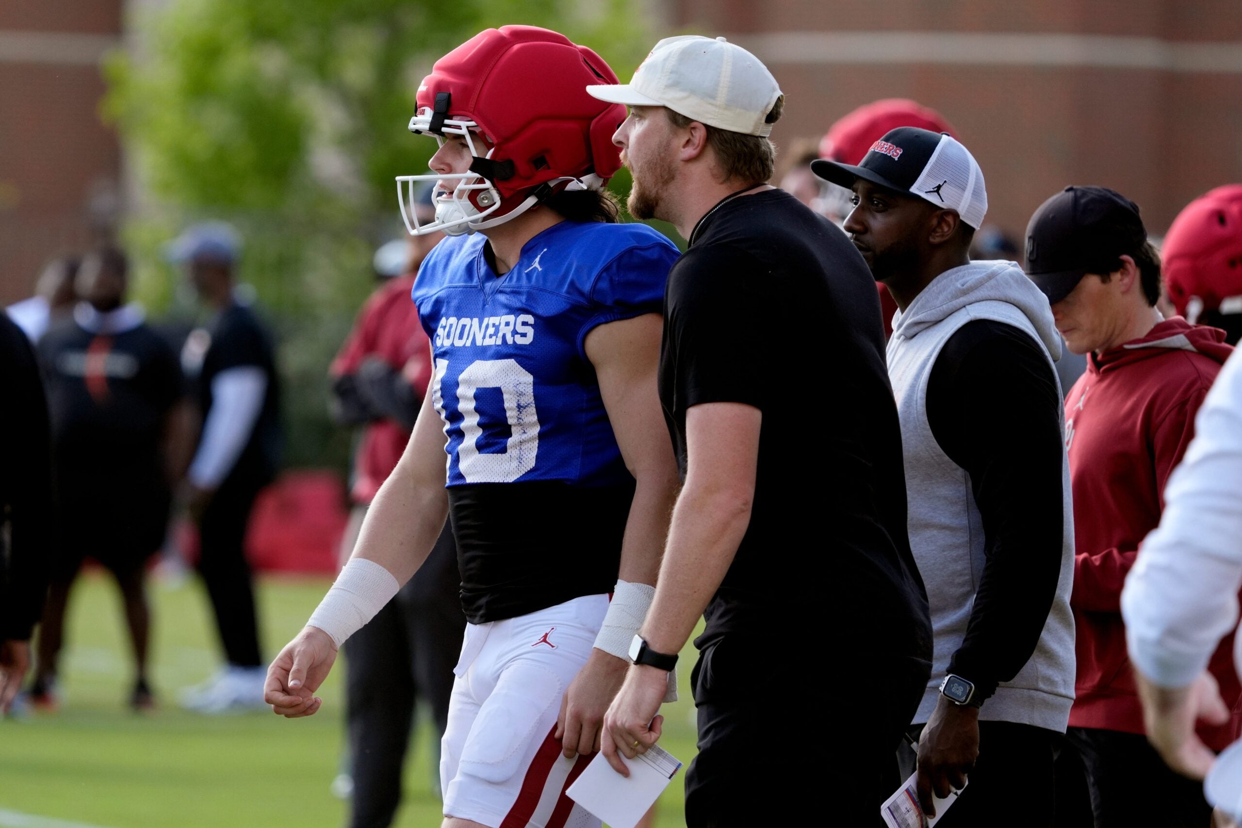 Oklahoma Sooners offensive coordinator Ben Arbuckle quarterback 2028 recruiting class