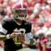 April 11, 2026; Tuscaloosa, AL, USA; Alabama quarterback Keelon Russell rolls out and throws a touchdown pass at Bryant-Denny Stadium during the Alabama A Day scrimmage.