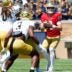 Notre Dame quarterback CJ Carr, right, looks for a teammate to pass to during the Blue-Gold spring game at Notre Dame Stadium on Saturday, April 25, 2026, in South Bend.