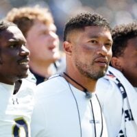 Notre Dame head coach Marcus Freeman, center, after the Blue-Gold spring game at Notre Dame Stadium on Saturday, April 25, 2026, in South Bend.
