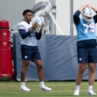 Tennessee Titans first round pick defensive end Keldric Faulk (15) (31st overall) goes through stretching drills with sixth round pick center Pat Coogan (79) during the Titans Rookie Camp Day 1 at Vanderbilt Health Football Center in Nashville, Tenn., Friday, May 1, 2026.