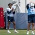 Tennessee Titans first round pick defensive end Keldric Faulk (15) (31st overall) goes through stretching drills with sixth round pick center Pat Coogan (79) during the Titans Rookie Camp Day 1 at Vanderbilt Health Football Center in Nashville, Tenn., Friday, May 1, 2026.