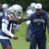May 1, 2026; Frisco, TX, USA; Dallas Cowboys cornerback Caleb Downs (18) is coached through a drill with defensive coordinator Christian Parker at the Ford Center at the Star Training Facility in Frisco, Texas.
