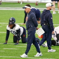 May 8, 2026; Lake Forest, IL, USA; Chicago Bears defensive coordinator Dennis Allen walks on the field during Rookie Minicamp at Halas Hall.