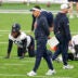 May 8, 2026; Lake Forest, IL, USA; Chicago Bears defensive coordinator Dennis Allen walks on the field during Rookie Minicamp at Halas Hall.