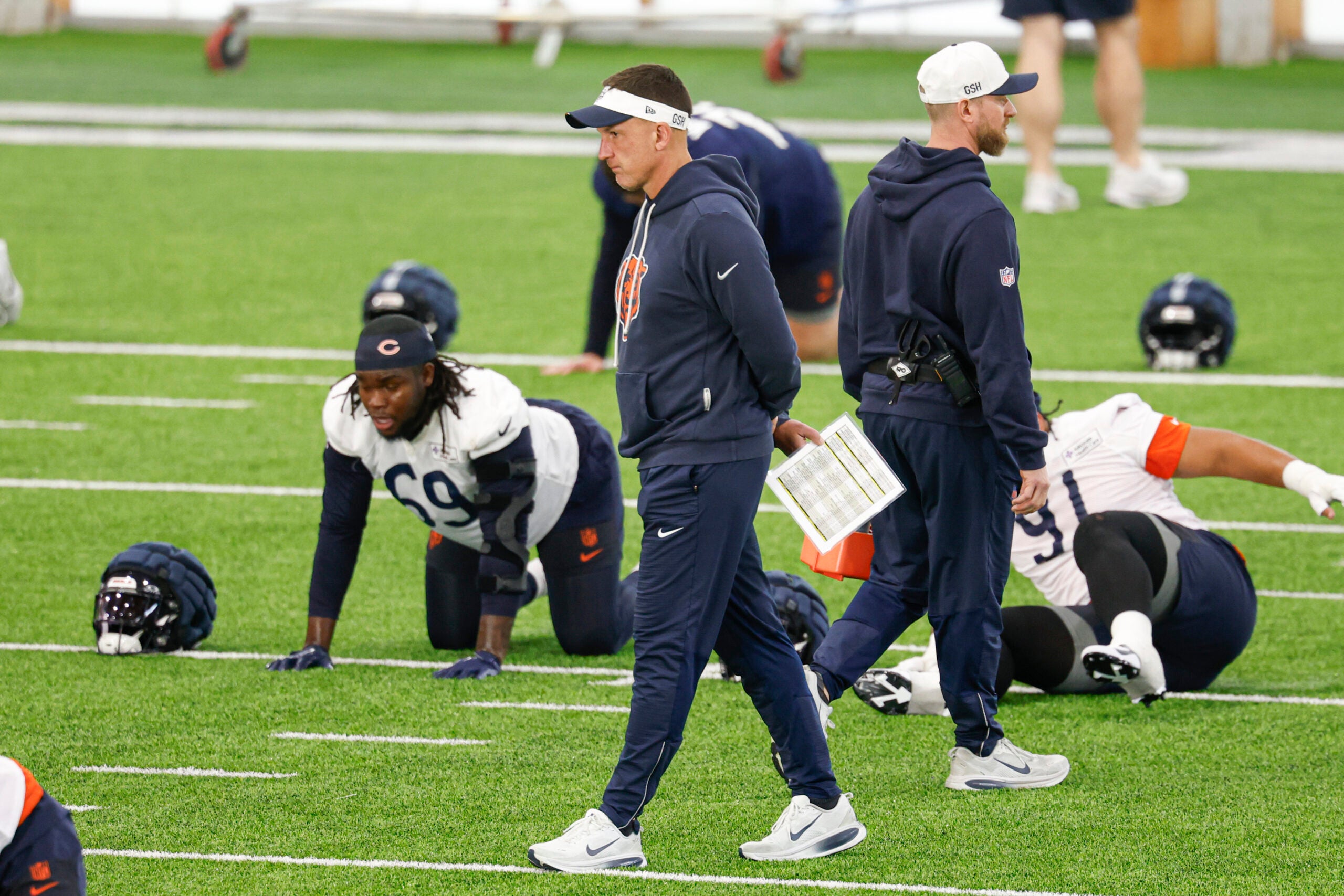 May 8, 2026; Lake Forest, IL, USA; Chicago Bears defensive coordinator Dennis Allen walks on the field during Rookie Minicamp at Halas Hall.