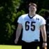 Cincinnati Bengals center Connor Lew (65) walks during a practice session at the Kettering Health Practice Fields in Cincinnati on Tuesday, May 12, 2026.