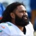 Oct 19, 2014; Chicago, IL, USA; Miami Dolphins center Samson Satele (64) during the second half at Soldier Field. Miami Dolphins defeat the Chicago Bears 27-14.