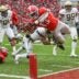Nov 24, 2018; Athens, GA, USA; Georgia Bulldogs running back Elijah Holyfield (13) dives for a touchdown against the Georgia Tech Yellow Jackets during the first half at Sanford Stadium.