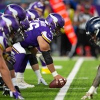 Aug 18, 2019; Minneapolis, MN, USA; Minnesota Vikings offensive lineman Garrett Bradbury (56) prepares to snap the ball against the Seattle Seahawks at U.S. Bank Stadium.