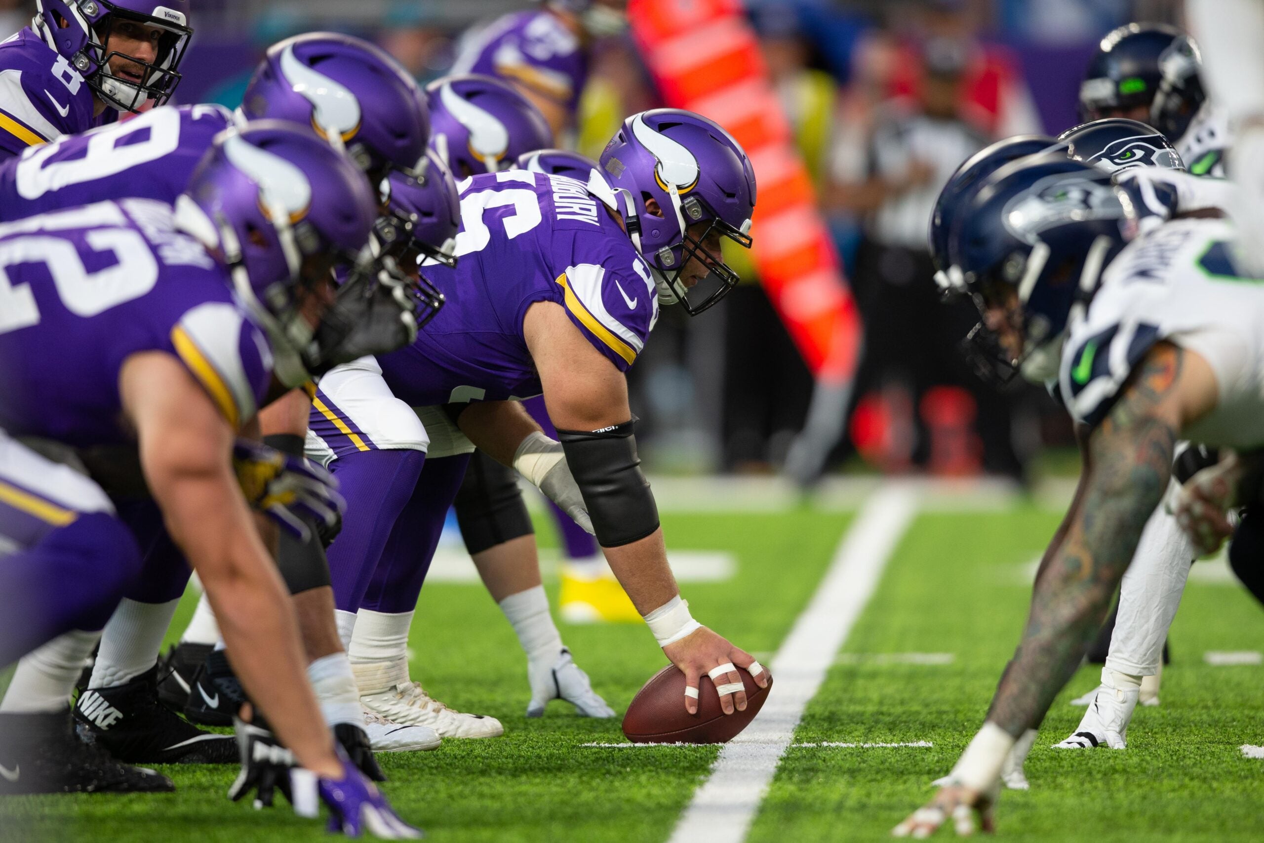 Aug 18, 2019; Minneapolis, MN, USA; Minnesota Vikings offensive lineman Garrett Bradbury (56) prepares to snap the ball against the Seattle Seahawks at U.S. Bank Stadium.