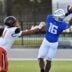 IMG Academy wide receiver Eric McFarland (#16) pulls in a pass in the end zone over Cocoa High free safety CJ Hester (#1) in the first quarter. The IMG Academy National squad hosted the Cocoa High School Tigers Friday, Sept. 6, 2024 in Bradenton.