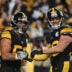 Oct 28, 2024; Pittsburgh, Pennsylvania, USA; Pittsburgh Steelers linebacker Alex Highsmith (56) celebrates with T.J. Watt (90) after sacking New York Giants quarterback Daniel Jones (8) during the third quarter at Acrisure Stadium.
