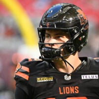 Jun 7, 2025; Vancouver, British Columbia, Canada; BC Lions quarterback Nathan Rourke (12) warms up prior to the first half against the Edmonton Elks at BC Place Stadium.