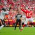 Aug 22, 2025; Kansas City, Missouri, USA; Kansas City Chiefs quarterback Patrick Mahomes (15) throws a pass against Chicago Bears defensive end Dayo Odeyingbo (55) during the first half at GEHA Field at Arrowhead Stadium.