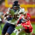 Aug 22, 2025; Kansas City, Missouri, USA; Chicago Bears wide receiver Rome Odunze (15) runs with the ball against Kansas City Chiefs safety Bryan Cook (6) during the first half at GEHA Field at Arrowhead Stadium.