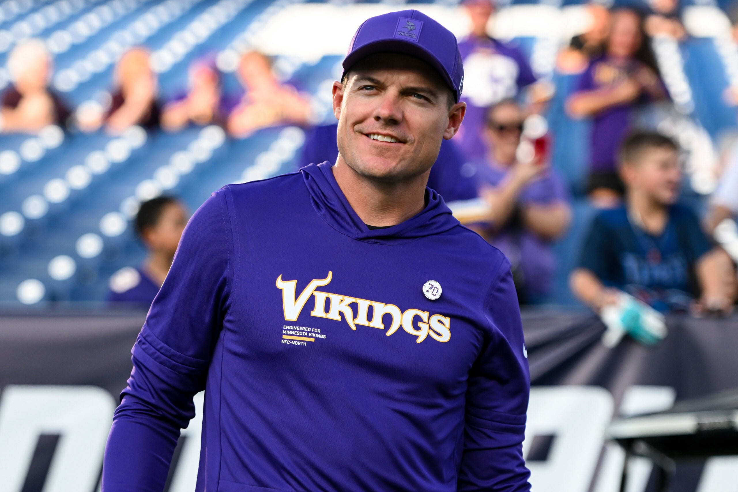 Aug 22, 2025; Nashville, Tennessee, USA; Minnesota Vikings head coach Kevin O'Connell walks to the field against the Tennessee Titan during the first half at Nissan Stadium.