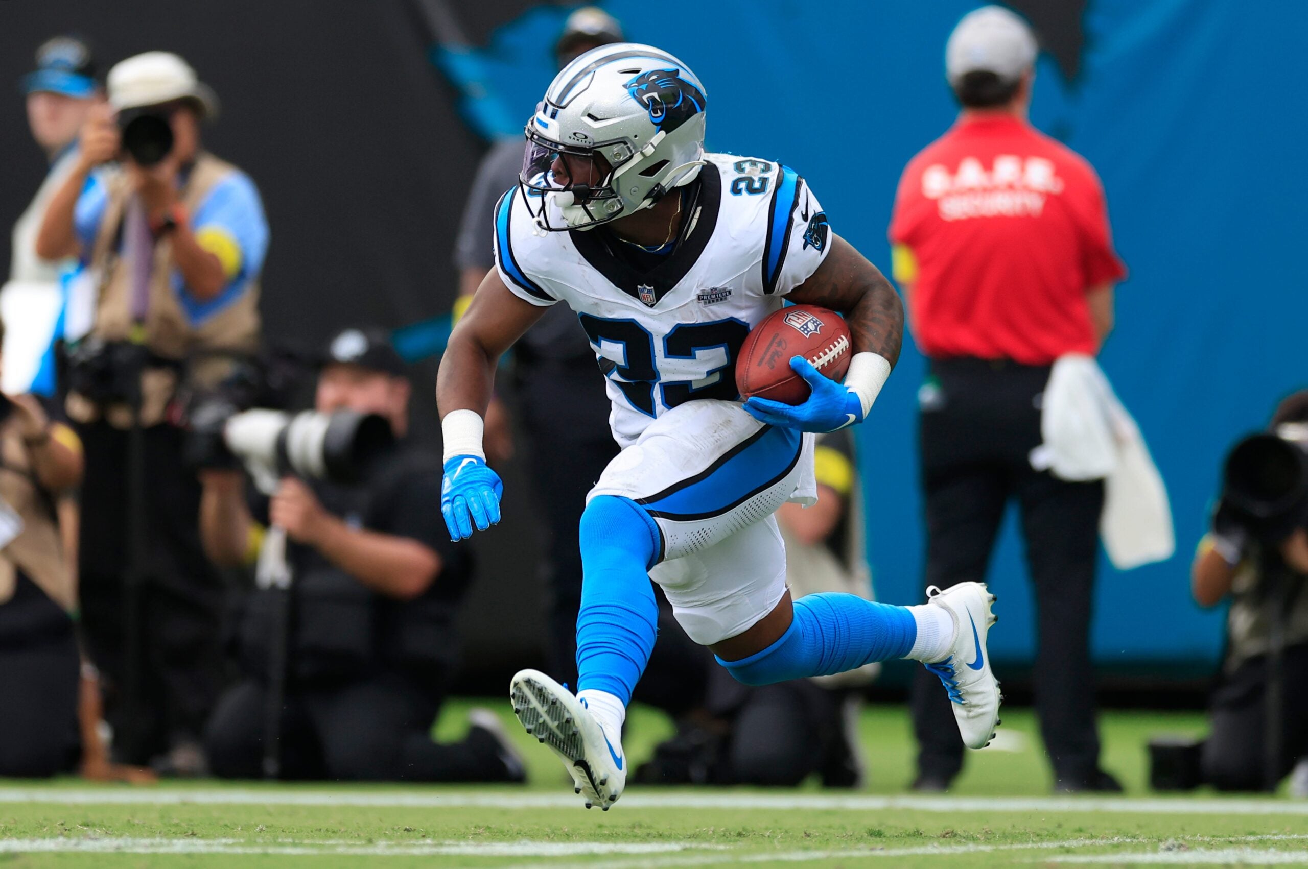 Carolina Panthers running back Trevor Etienne (23) returns a kickoff during the second quarter of an NFL football matchup at EverBank Stadium, Sunday, Sept. 7, 2025 in Jacksonville, Fla.