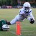 IMG Academy's Eric McFarland (3) scores a rushing touchdown against Mandarin's Tamajh Mitchell (7) during the first quarter of a high school football matchup at Mandarin High School, Friday, Sept. 19, 2025, in Jacksonville, Fla. The IMG Academy Ascenders defeated the Mandarin Mustangs 57-7.