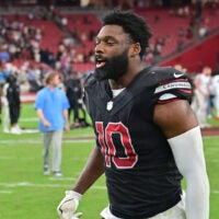 Oct 5, 2025; Glendale, Arizona, USA; Arizona Cardinals outside linebacker Josh Sweat (10) walks off the field at the end of their game against the Tennessee Titans at State Farm Stadium.