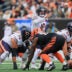 Nov 2, 2025; Cincinnati, Ohio, USA; Chicago Bears quarterback Caleb Williams (18) gestures toward the Cincinnati Bengals defense at the line of scrimmage during the first quarter at Paycor Stadium.