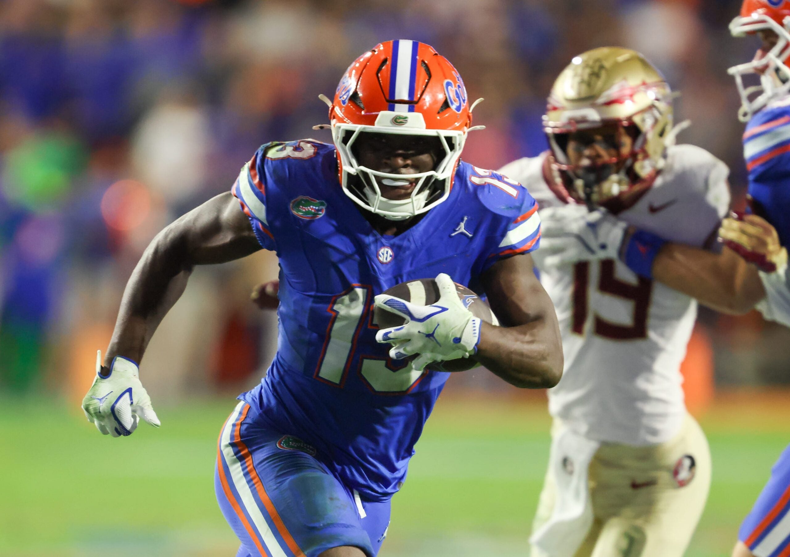 Florida running back Jadan Baugh (13) runs in for a touch down during the second half of an NCAA football game at Steve Spurrier Field at Ben Hill Griffin Stadium in Gainesville, FL on Saturday, November 29, Florida beat Florida State 40-21.2025. Alan Youngblood/Gainesville Sun