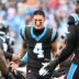 Dec 21, 2025; Charlotte, North Carolina, USA; Carolina Panthers wide receiver Tetairoa McMillan (4) runs on to the field before the game at Bank of America Stadium.