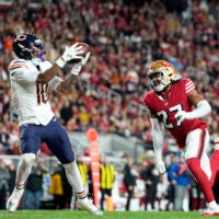 Dec 28, 2025; Santa Clara, California, USA; Chicago Bears wide receiver Luther Burden III (10) makes a catch to score a touchdown against the San Francisco 49ers in the first half at Levi's Stadium.